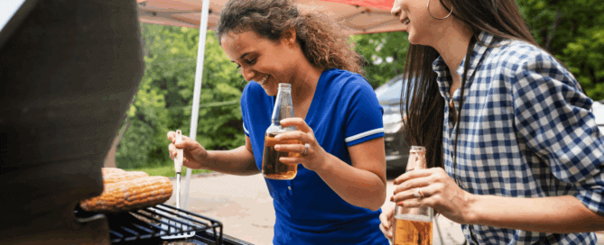 No cash job in barbeque party. Family enjoying a summer barbeque in the backyard with friends.